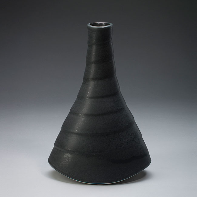 hand-thrown porcelain clay vessel with black matt glaze