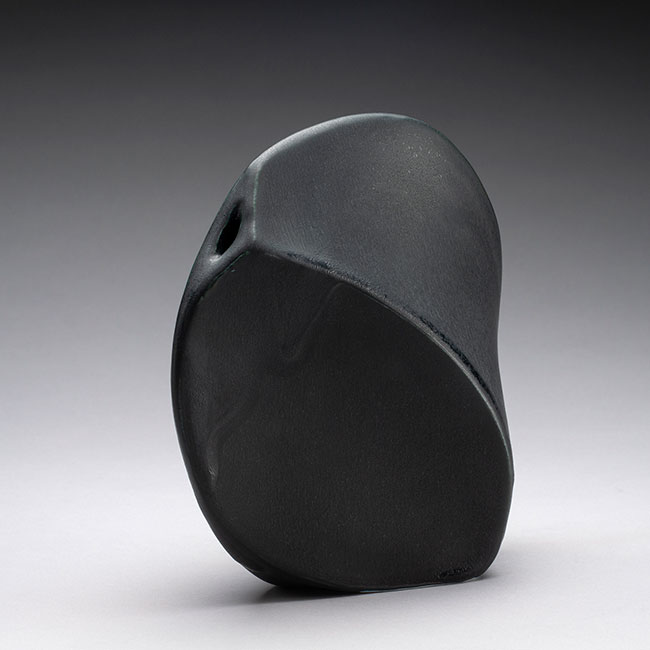 hand-made porcelain clay vessel with black matt glaze