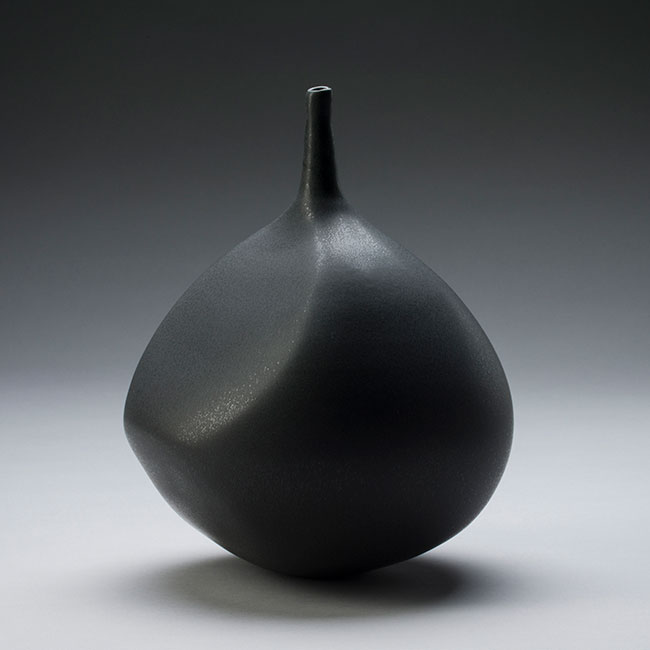 hand-thrown porcelain vessel with black crystalline matt glaze