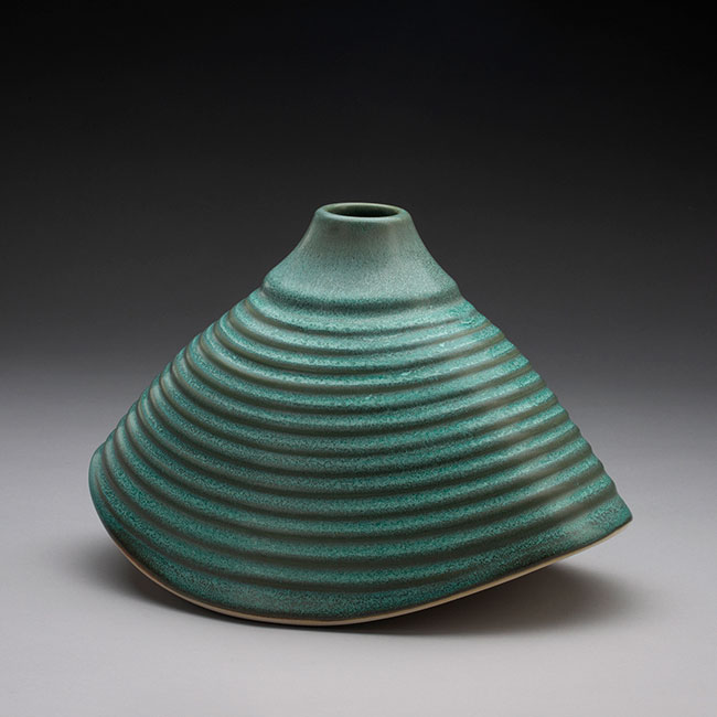 hand-thrown porcelain clay vessel with bronze green matt glaze