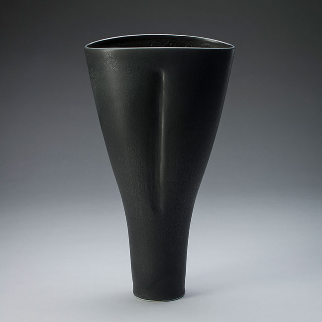 hand-thrown porcelain clay vessel with black mat glaze