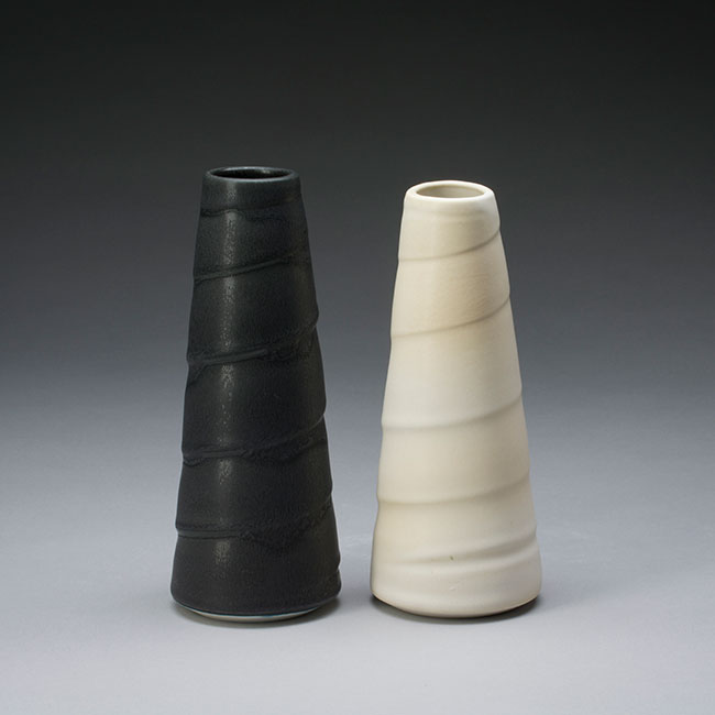 hand-thrown porcelain vases with black and white mat glaze