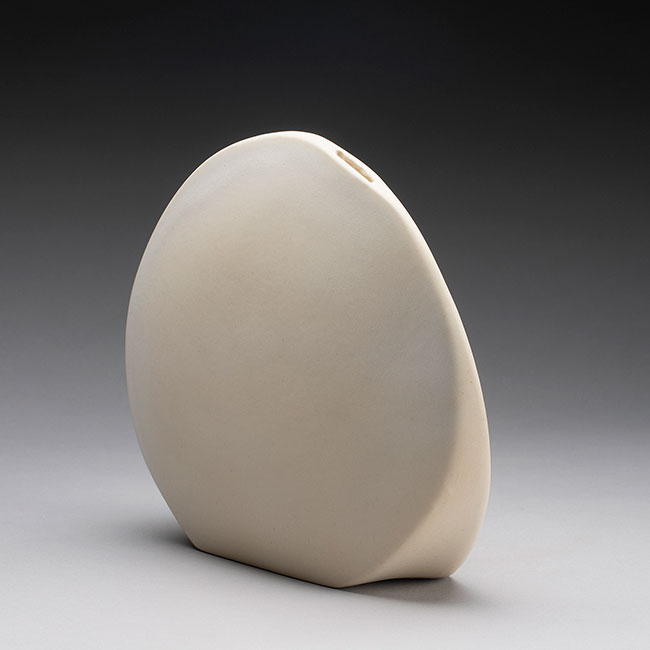 hand-made porcelain clay vessel with white matt glaze