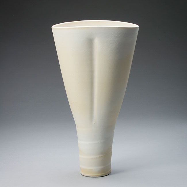 hand-thrown porcelain clay vessel with black white glaze