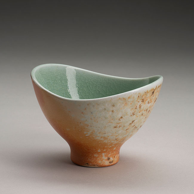 wood/salt fired porcelain bowl with celadon glaze on inside